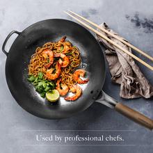 https://www.woklove.com/wp-content/uploads/2021/06/Traditional-hand-hammered-flat-bottomed-carbon-steel-wok-with-food-1.jpg