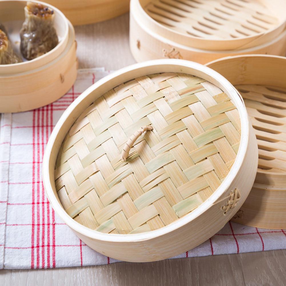 https://www.woklove.com/wp-content/uploads/2021/08/Traditional-bamboo-steamer-pot-with-2-baskets-in-use.jpg